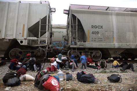 Migrants risk life and limb to jump Mexico trains in rush to border