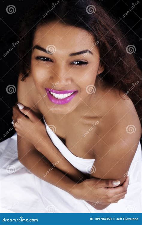 Smiling Attractive Latina Woman Wrapped In Sheet Stock Image Image Of