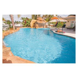 Swimming Pool With Custom Waterfalls And Sun Shelf In Lighthouse Point