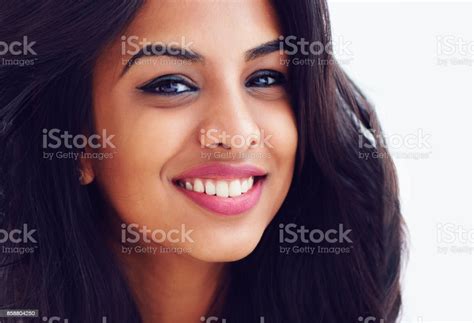 Closeup Portrait Of Beautiful Young Smiling Indian Woman Stock Photo