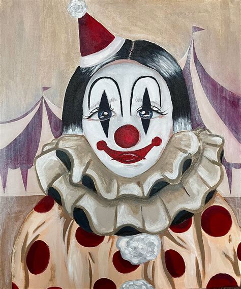 sad female clown painting