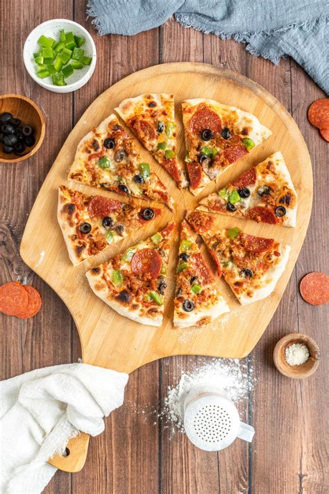 Crispy Thin Crust Homemade Supreme Pizza The Practical Kitchen