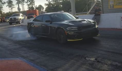 Dodge Charger Hellcat Drag Races Tuned BMW M5 Gets Surprised