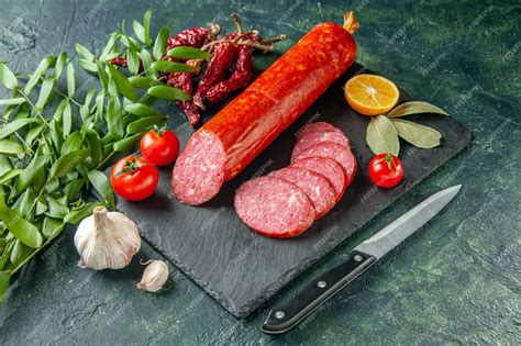 Free Photo | Front view fresh tasty sausage with tomatoes on blue meat ...