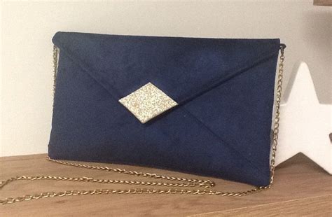 Pochette mariage bleu marine en suédine paillettes dorées Pochette