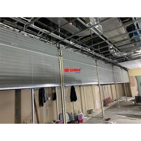 Pemasangan Rolling Door One Sheet Full Perforated Di Tenant Oppo Store