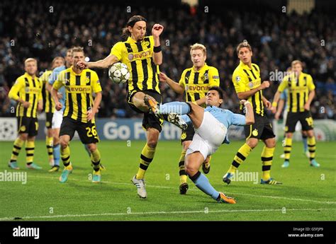 Manchester City S Sergio Aguero Has A Shot Blocked By The Hand Of