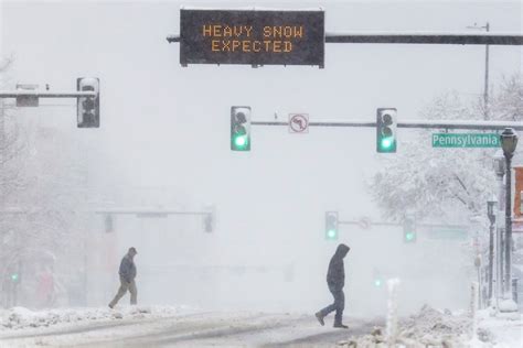 Photos From Blizzard Warning Issued As Denver Gets Major Snow Storm