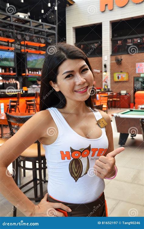 Hooters Girl Poses for Photo in Hooters Restaurant Editorial ...