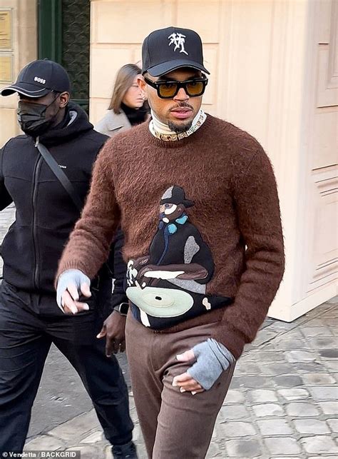 Chris Brown Flashes The V Sign As He Heads On A Night Out In Paris