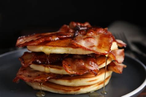 Delicious Pancakes With Maple Syrup And Fried Bacon On Plate Closeup Stock Image Image Of