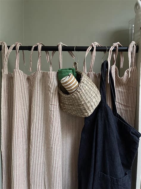 How To Use A Tension Rod To Make Cute Storage Space Anywhere In Your Home