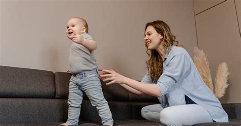 Happy Mother Guiding Her Child · Free Stock Photo