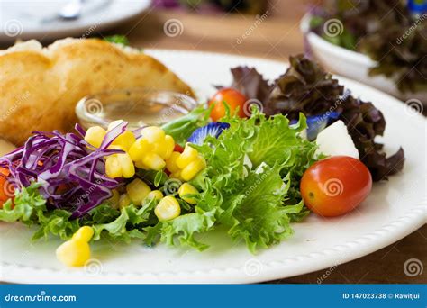 Salad Side Dish on a White Plate Stock Photo - Image of gourmet, leaf: 147023738