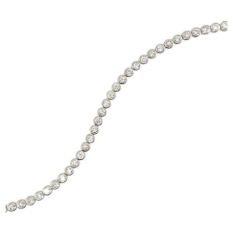 18ct White Gold Timeless Diamond Tennis Bracelet Set With 3 55ct Of