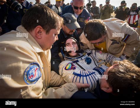 Nasa Expedition 36 Astronaut Chris Cassidy Is Carried To The Medical Tent Shortly After Landing