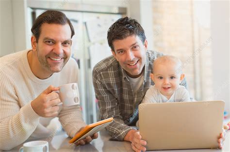 Portrait Smiling Male Gay Parents With Baby Stock Image F018 5588 Science Photo Library