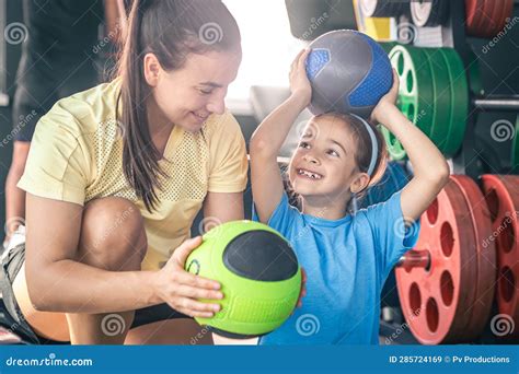 Happy Mom And Daughter In The Gym With Balls Stock Image Image Of