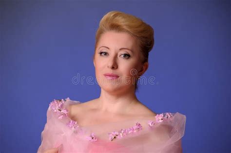 Blonde Forty Years Old In Studio Portrait In Pink Stock Image Image