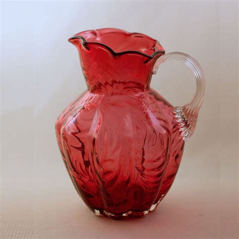 Fenton Cranberry Glass Pitcher With Embossed Fern Design Reed Handle The Townhouse Antiques