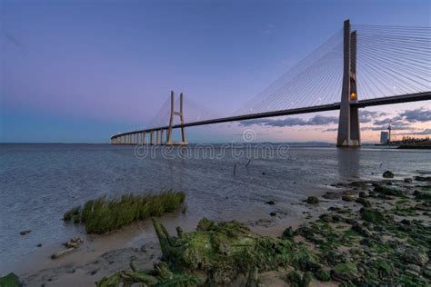 Ponte Vasco Da Gama Bridge View Near the Rio Tejo River after Sunset, Portugal Stock Image ...