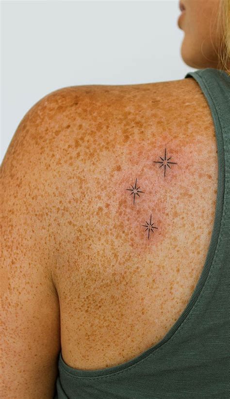 50 Small Tattoo Ideas Less Is More Sparkling Stars Tattoo On Back