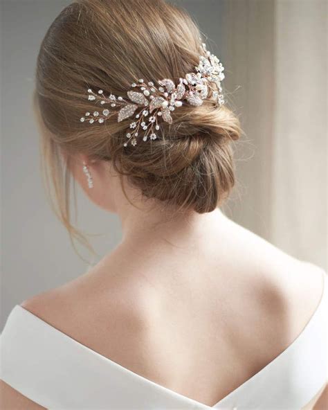 A Woman Wearing A Bridal Hair Comb With Pearls On The Back Of Her Head