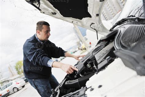 man car repair 10956497 Stock Photo at Vecteezy