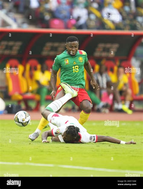 Steeve Yago Of Burkina Faso Fouling Martin Hongla Of Cameroon During