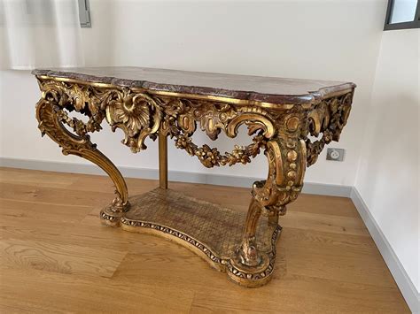 CONSOLE LOUIS XV EN BOIS SCULPTE ET DORE XIX SI Antikeo