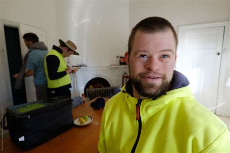 Man Standing In A Country Home Smiling At Camera By Stocksy