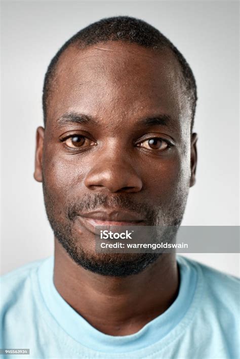 Studio Portrait Of African Man With No Expression Stock Photo