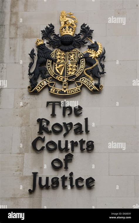 Close Up Of Sign On The Side Of The Royal Courts Of Justice In The