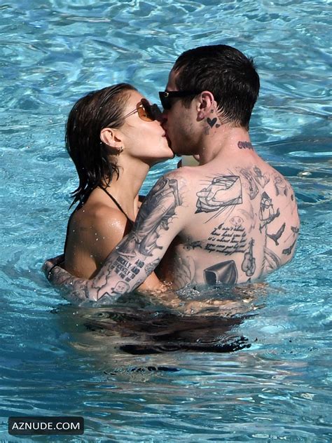 Kaia Gerber Wears A Black Bikini As She Kisses Boyfriend Pete Davidson By The Pool In Miami Aznude