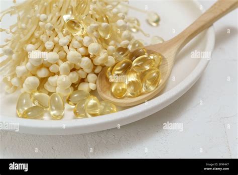 Mushroom Or Enoki Close Up Useful And Medicinal Properties Of Asian