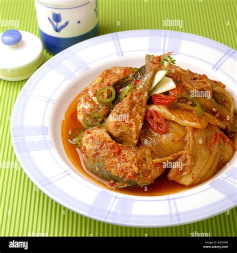 Steamed fish with vegetables Stock Photo - Alamy