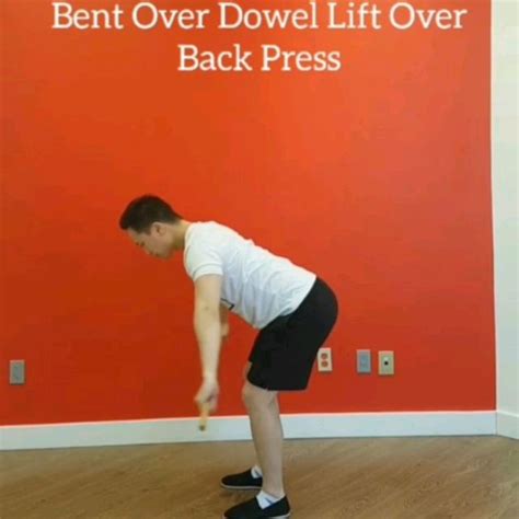 Bent Over Dowel Lift Over Back Press Exercise How To Workout