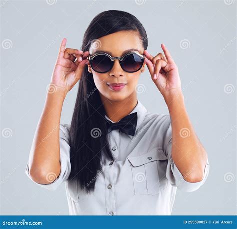 Trendy Vibes Cropped Portrait Of A Trendy Young Woman Wearing Shades