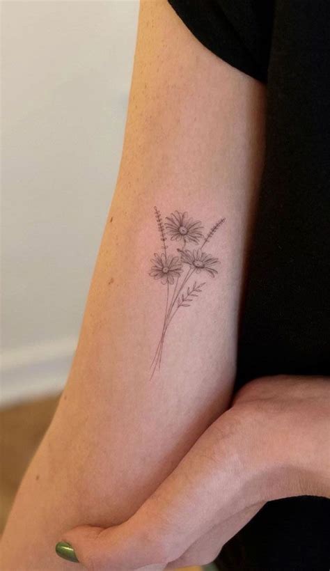 30 Beautiful Flower Tattoo Ideas A Bunch Of Daisy Realistic Flower