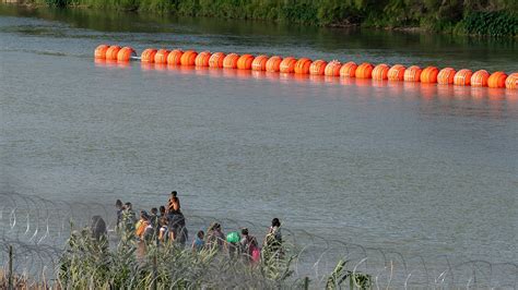 Justice Department Sues Texas Over Floating Border Barrier In The Rio