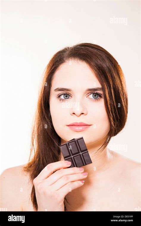 Woman Enjoying Chocolates Hi Res Stock Photography And Images Alamy