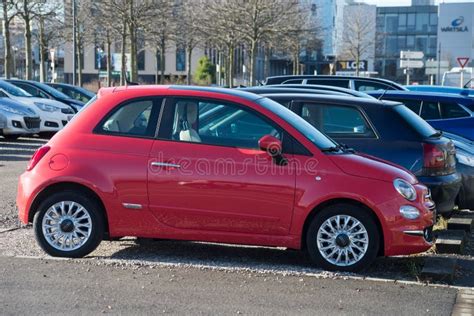 Profile View Of Fiat 500 Parked In Public Parking In The Street