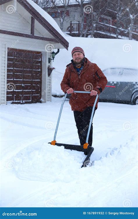 Man Cleans Snow With A Shovel Stock Photo Image Of Clean Labor