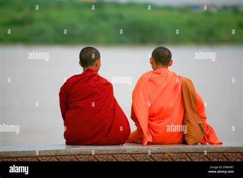 Buddhist Monks In Orange Robes In Cambodia Stock Photo Alamy