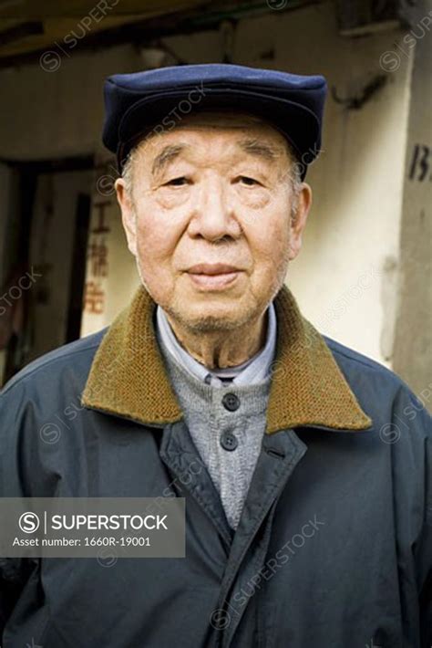 Mature Man With Hat Outdoors Superstock