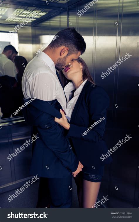 Sensual Business Couple Undressing Elevator Stock Photo Edit Now