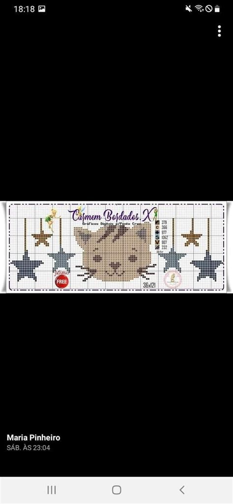 A Cross Stitch Pattern With A Bear In The Center And Stars Around It