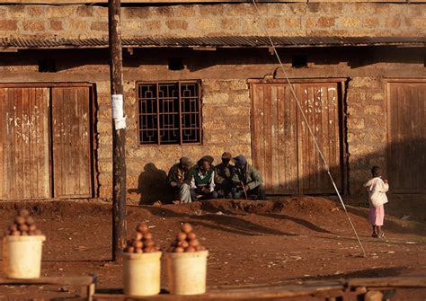 Kenyan Men Chatting In Front Of A Building Nakuru County Nakuru