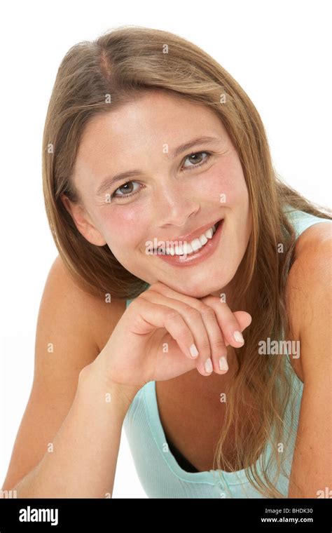 Studio Portrait Of Smiling Young Woman Stock Photo Alamy