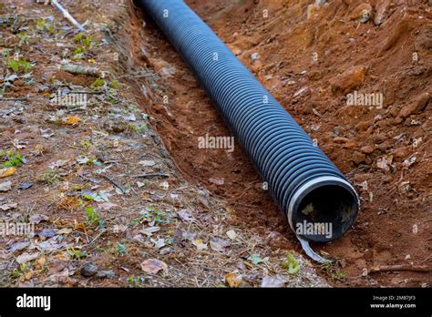 Laying For Underground Installation Of Pvc Sewage Black Pipes In Ground